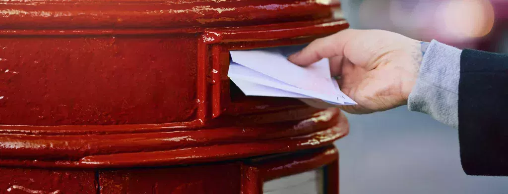 Posting mail after using a franking machine